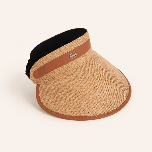 Khaki raffia wide brim sun visor for women with open-top design, brown trim, and adjustable back closure.