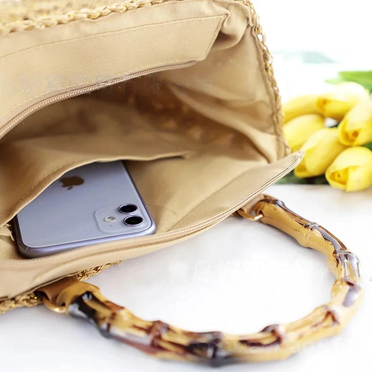 solmerea-medium-straw-handbag-with-bamboo-handle_interior_with-phone