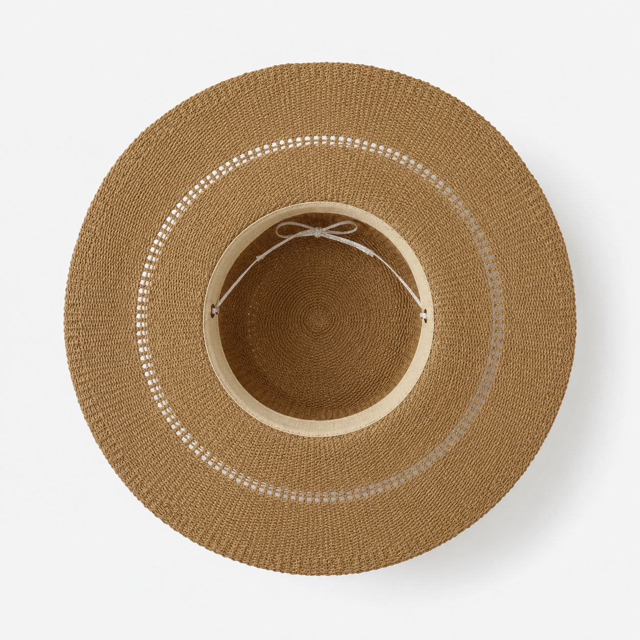 Inside view of an adjustable wide brim paper straw sun hat showing the inner fit detail