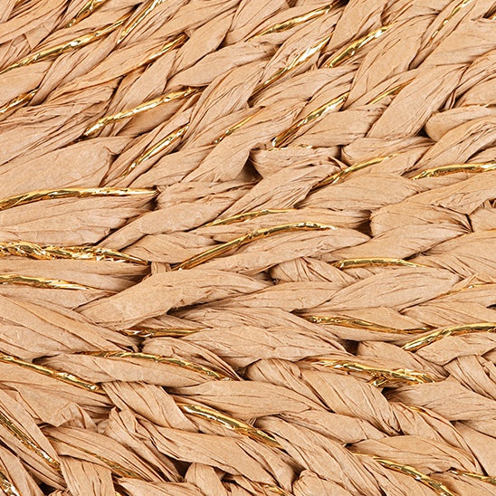 Macro view of the natural straw weaving pattern interlaced with gold fibers, showing detailed craftsmanship.