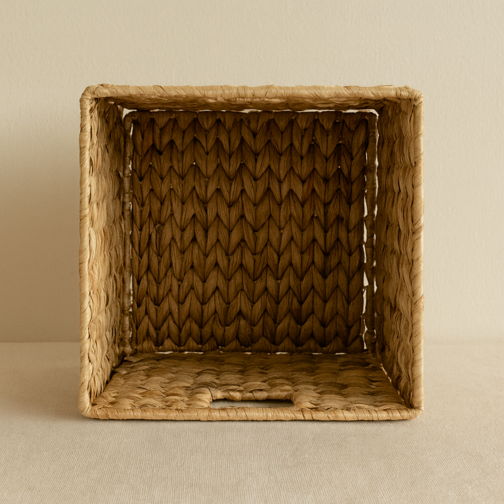 Interior view of water hyacinth basket showing tight handwoven pattern and natural texture.
