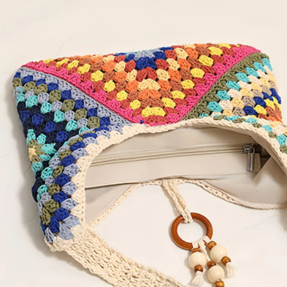 Top view of the multicolor woven shoulder bag showing the zipper closure and soft cotton lining.