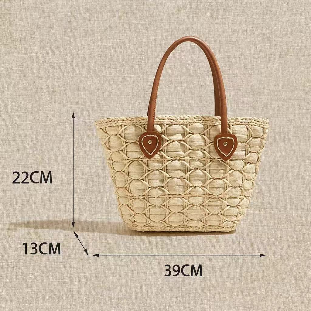 Size reference image of handwoven straw tote bag with brown handles, showing dimensions: 39cm width, 22cm height, 13cm depth.