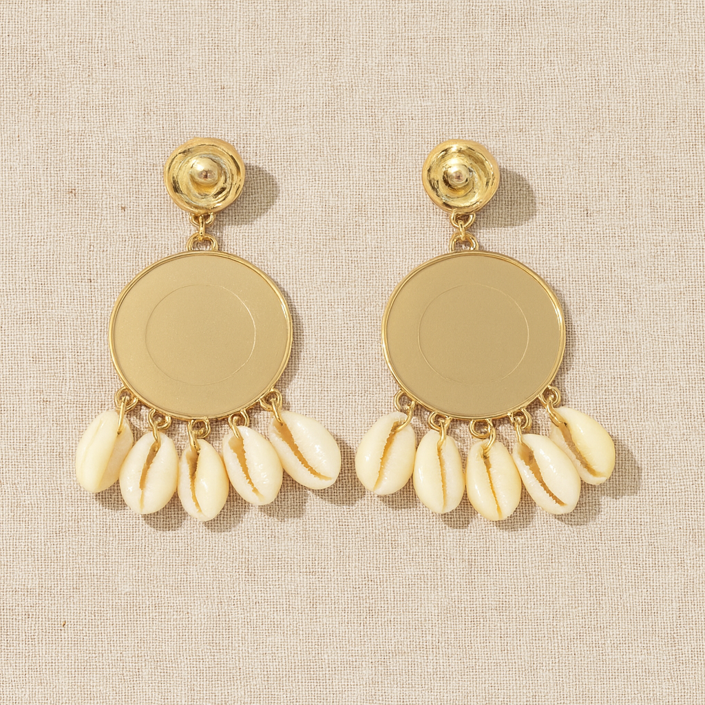 Back view of gold-tone shell earrings showing smooth metallic base and shell drops.