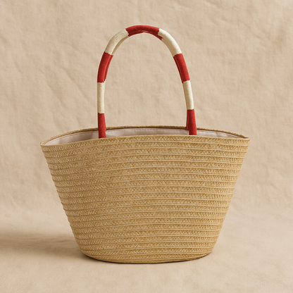 “Back view of straw tote bag showing plain weave texture and red-white wrapped handles, by Solmerea.”