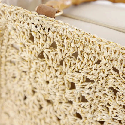 “Close-up of beige crochet straw weave with gold-thread detail on Solmerea bamboo handle handbag.”