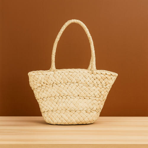 “Portable handwoven corn husk handbag with natural beige color and soft braided texture, by Solmerea.”