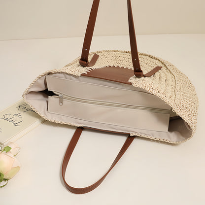 “Top view of beige straw clutch showing internal zipper pocket and neat lining, by Solmerea.”