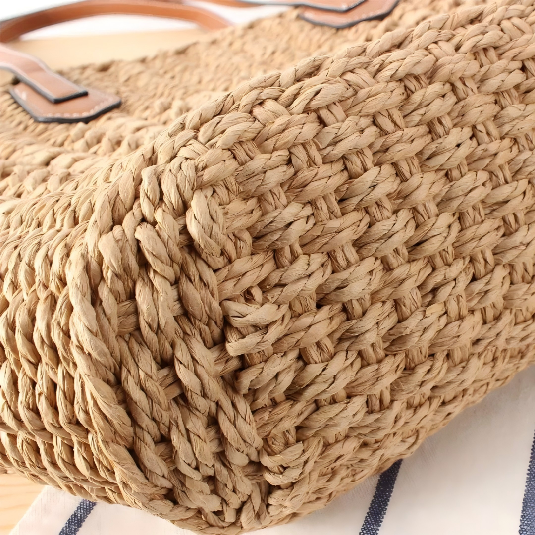 Close-up of reinforced straw base with tight braiding for durability, by Solmerea.
