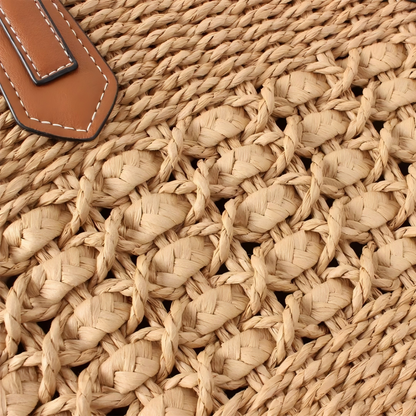 Macro view of airy lattice weave panel on straw tote for breathable texture, by Solmerea.