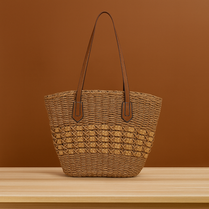 Large straw shoulder tote with leather straps in warm brown, woven band detail, by Solmerea.